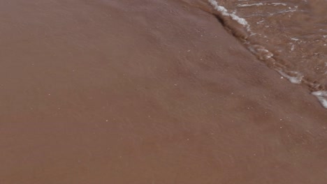 PEI-Red-Sand-Beach-With-Splashing-Water