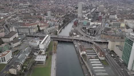 Drone-revealing-shot-above-Zürich-city,-Switzerland-4k