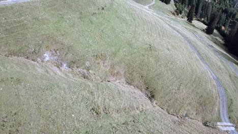 Drone-reveal-shot-over-alpine-landscape-4k