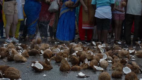 Thaipusam-Festival,-throw-coconuts