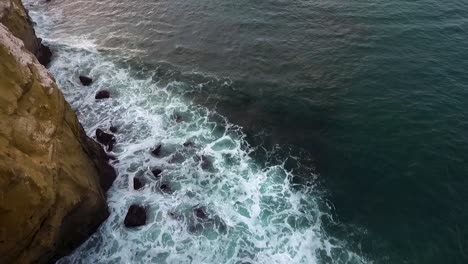 Waves-crashing-on-cliffs