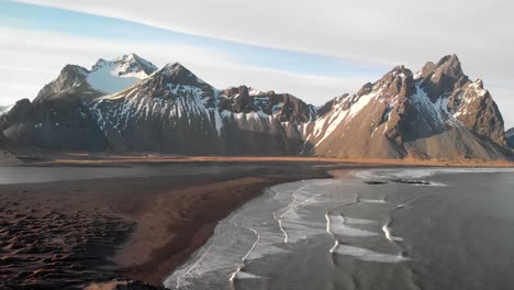 Drone-shot-of-Vestrahorn-Mountains-in-Hofn,-Iceland