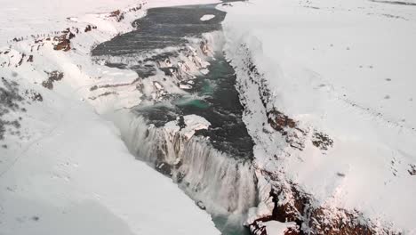 Drone-shot-of-Gullfoss-waterfall-in-Iceland-during-winter