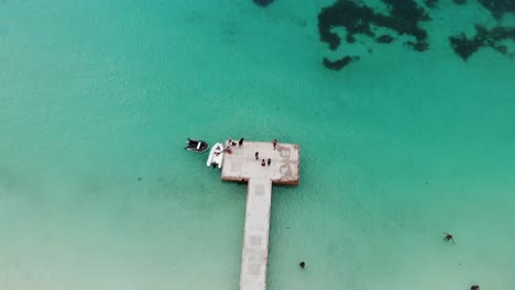 Epic-drone-fly-high-shot-of-jetty-found-on-the-beautiful-Grande-Anse-beach-in-Grenada