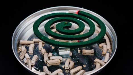 Mosquito-Coil-Repellent-timelapse-with-dark-room-Close-Up-Of-Mosquito-Coil-timelapse-at-dark-room