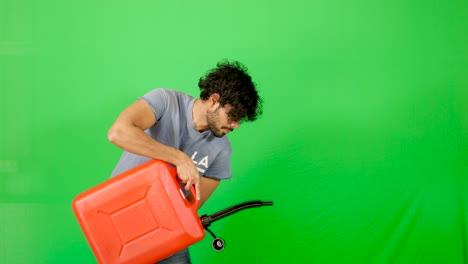 Indian-gut-carrying-heavy-petrol-container-with-green-screen---green-background