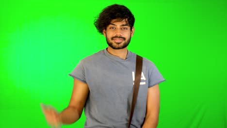 indian-tourist-is-walking-on-road-with-green-background---green-screen
