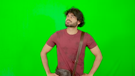 Indian-guy-questioning-himself-with-green-screen-green-background