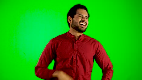 Indian-guy-have-muscle-pain-on-green-screen---green-table