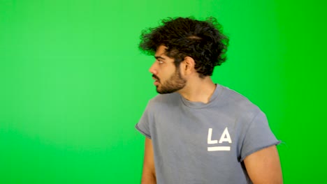 indian-guy-lost-his-wallet-with-green-background-green-screen