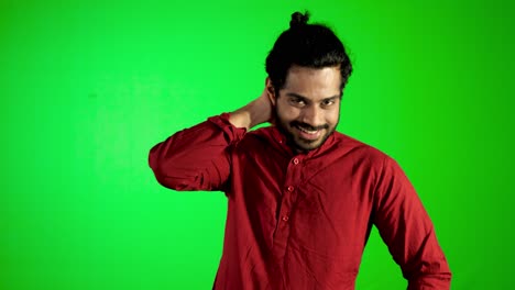 guy-showing-evil-face-with-green-screen---green-background
