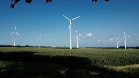 Shot-of-several-windmills-next-to-SEASUN-in-Full-HD,-'s-Gravenpolder,-Zeeland,-Netherlands