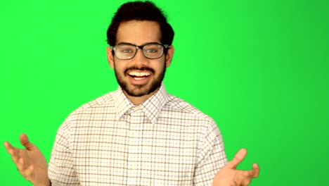 indian-business-guy-standing-with-green-background