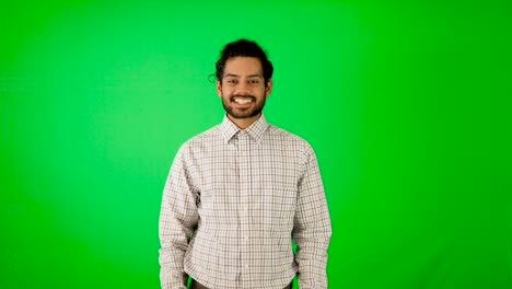 Indian-business-man-thumb-up-with-green-background