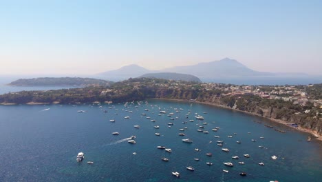 Aerial-of-the-island-of-Procida-with-the-island-of-Ischia-in-the-background