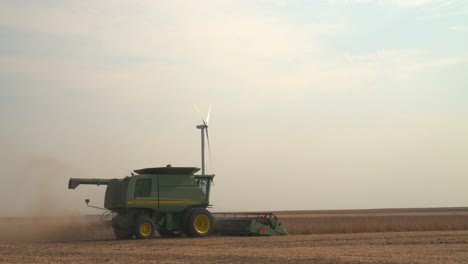 Farmer-combining-soybeans-on-a-fall-early-evening
