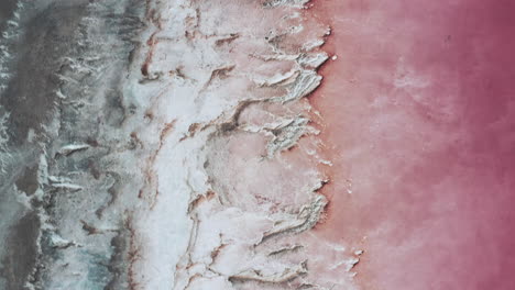Aerial-view-of-rare-and-unique-pink-salt-lake-shores