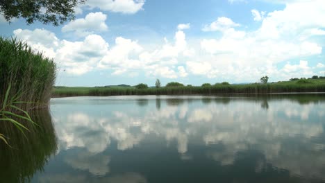 Clouds-reflect-on-the-lake-in-Summer