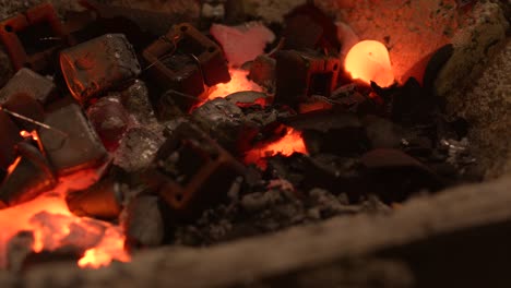 Close-shot-of-hot-lava-glowing-in-a-foundry