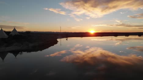 El-Paso,-TX.-Sunset,-drone-aerial-over-water