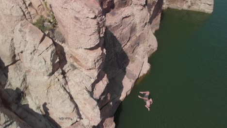 Man's-double-flip-with-twist-off-high-cliff-into-Little-Colorado-River