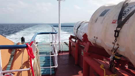 Oil-drums-labelled-for-separating-waste-are-stored-at-the-back-of-a-government-ferry-that-travels-between-islands-in-the-andaman-sea