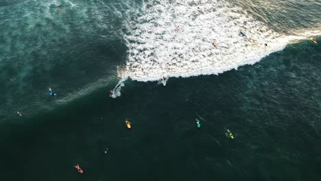 Many-surfers-catching-large-waves-off-the-coast-of-echo-beach-in-Canggu-Bali