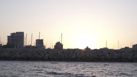 Landscape-view-from-a-boat,-Larnaca-Cyprus-sunset
