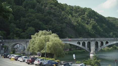 View-at-the-Belgian-railway-bridge-Pont-du-Chemin-du-Fer,-Huy,-Belgium,-Ardennes,-Europe,-4K,-50fps