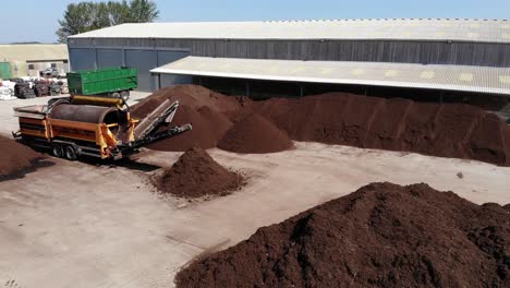 Composted-soil-in-piles-on-a-farm-yard