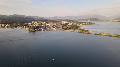 Aerial-drone-dolly-shot-flying-sideways-showing-Rapperswil-on-a-summer-evening