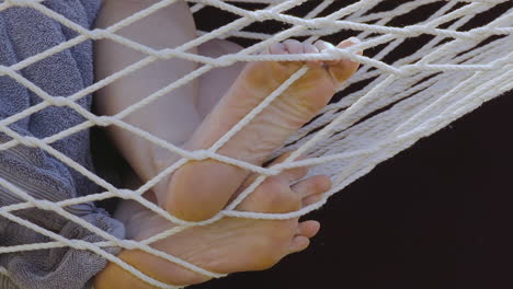 Closeup-of-a-woman’s-feet-on-a-hammock