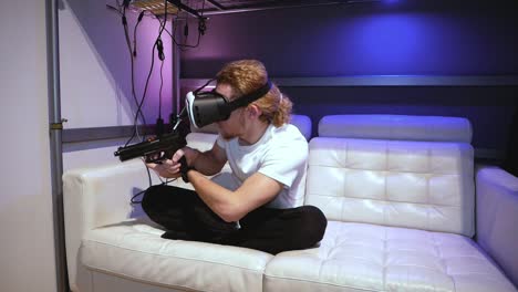 Dude-playing-first-person-shooter-in-metaverse-virtual-reality-then-quits