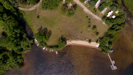 Top-down-done-shot-of-a-beautiful-beach-at-a-trailer-park-in-Canada