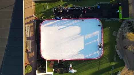 Aerial-overhead-shot-of-zamboni-clearing-ice-rink-in-downtown-Clarksville-Tennessee