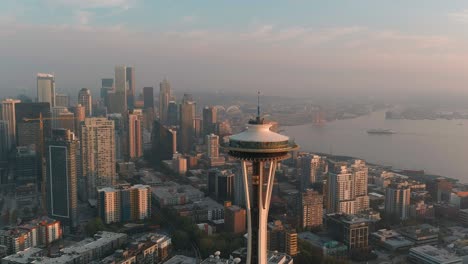 Slow-orbiting-aerial-of-the-Space-Needle-during-a-golden-sunset