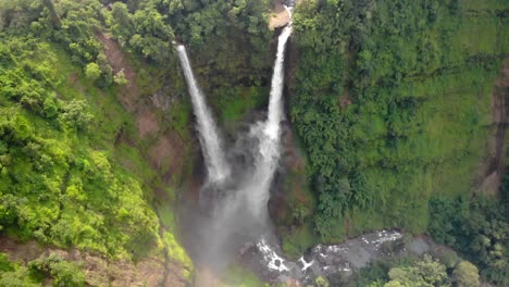 Slow-ascending-aerial-top-shot-at-Tad-Fane-Waterfall,-Paksong,-Laos