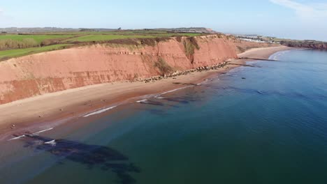 Aerial-View-Of-Orcombe-Cliff-Coastline-On-Sunny-Day