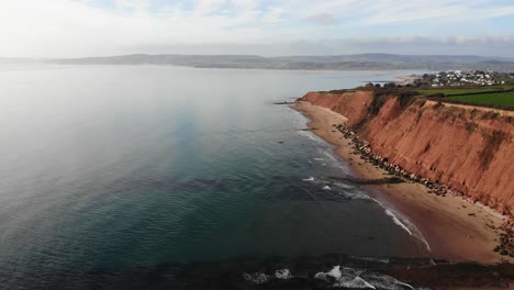 Aerial-Along-Exmouth-Jurassic-Coastline-With-Beside-Waters-Of-English-Channel