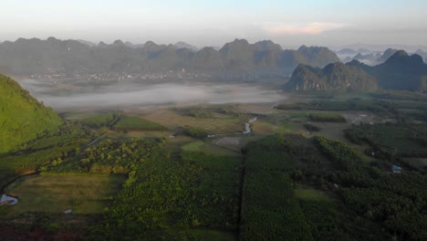 Aerial-dolly-in-over-valley-at-Phong-Nha,-Vietnam,-Ke-Bang-National-Park