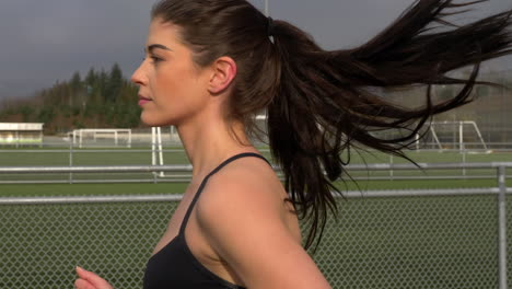 Close-Up-Gorgeous-Girl-Running-Outside,-Slow-Motion-Tracking