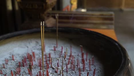 Incense-slowly-burning-in-quiet-Chinese-Taoist-temple