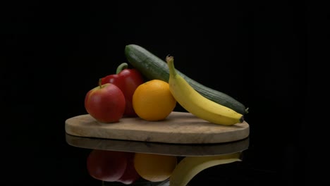 An-arrangement-of-fruits-slide-through-frame-on-a-wooden-cutting-board
