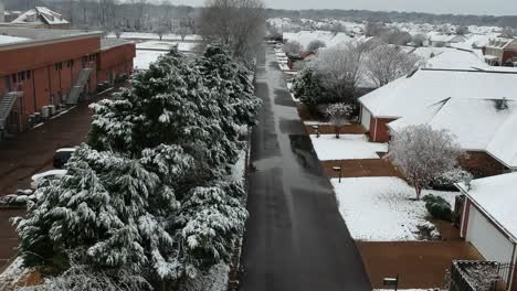 Drone-flies-over-neighborhood-covered-in-snow