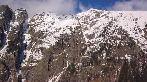 Mountain-Top-Snow-Ice-Tourism-Sport-Eco-Travel-Mountains-Peaks-Cliffs-Rocks-Ridges-Landscape-Drone-Aerial-Flight-at-Rila,-Bulgaria