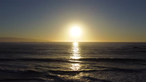 AERIAL:-golden-hour-beach-sunset