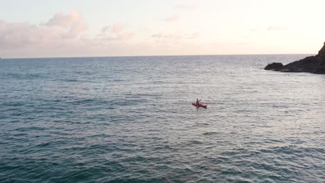 Person-Kayaking-In-The-Ocean-Near-Na-Mokulua-Island-In-Kailua,-Oahu,-Hawaii