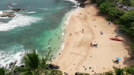 Flying-over-a-small-private-beach-in-Hawaii