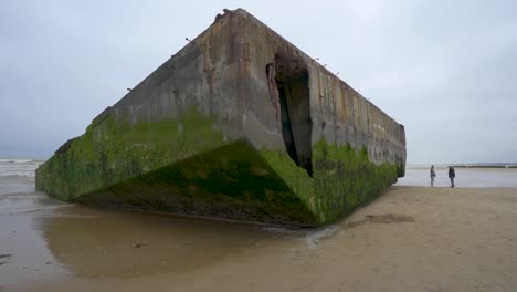 Large-WW2-Bunker-on-Beach-in-Normandy-France,-Arromanches-les-bain