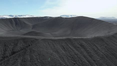 Zoom-out-aerial-of-the-black-Hverfell-vulcano-on-Iceland